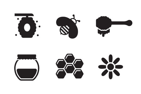 Set of bee and honey icons in black design isolated on white backgroundのイラスト素材