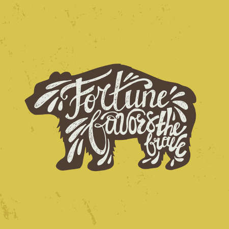 Handdrawn inspirational and encouraging quote "Fortune favors the brave" in a shape of a bear. Vector isolated typography design element for greeting cards, posters and print invitations.のイラスト素材