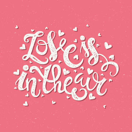 Love is in the air - vector hand lettering. Perfect poster or card design. Typographic vector.のイラスト素材
