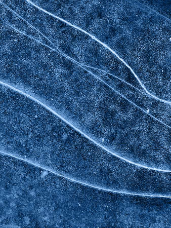 Texture of frozen blue lake
