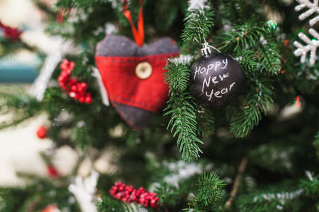 Christmas tree with decorative ball, heart. Closeupの写真素材