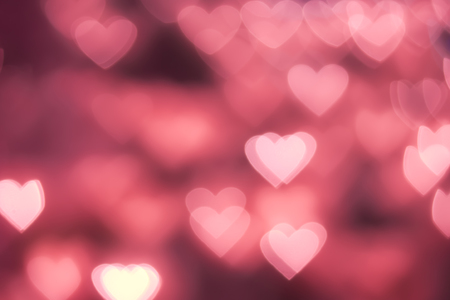 Pink Heart shape bokeh backgroundの写真素材
