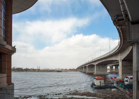 Fishing vessel cloud bridge over Songhua Riverの写真素材