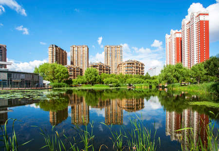 City Scenery reflection building blue sky and white cloudsのeditorial素材