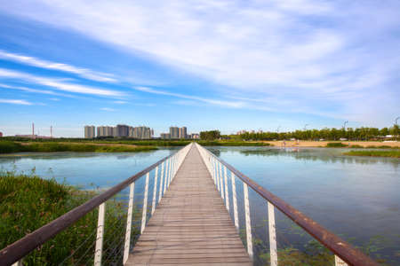 Urban scenery clouds reflection plankのeditorial素材