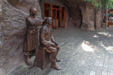 The barber sculpture at harbin guandong ancient laneのeditorial素材