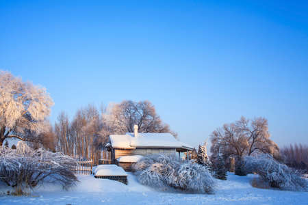 The morning sunlight in winter snow rime farmhouseのeditorial素材