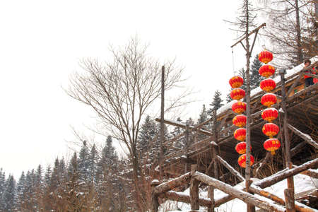 Snow Township with red lantern and evening Observatory