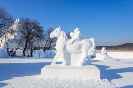 Landscape view of a snow sculpture under the blue sky in Anhui city, Chinaのeditorial素材
