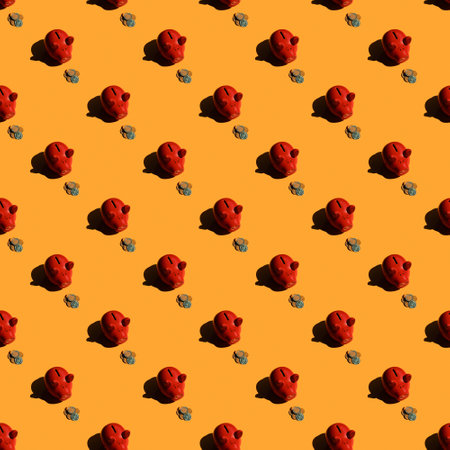 Sad piggy bank looks at euro coins. Red piggy bank with bunch of coins. Seamless pattern, small pigs. Orange background.の写真素材