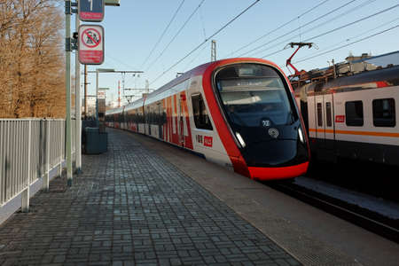 Moscow, Russia - February 27, 2022: train arrives at Moscow Central Diameter MCD station.