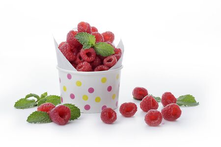 Ripe red berries isolated on a black and white background. - Image