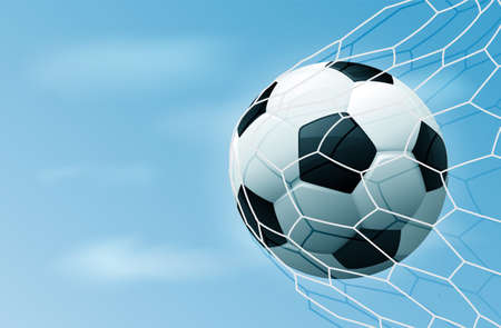 Soccer ball in goal net with blue sky. Realistic football in net with copy space for text. Stock illustration.の写真素材