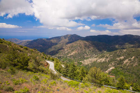 The road through the mountains with view to North Cyprusの写真素材