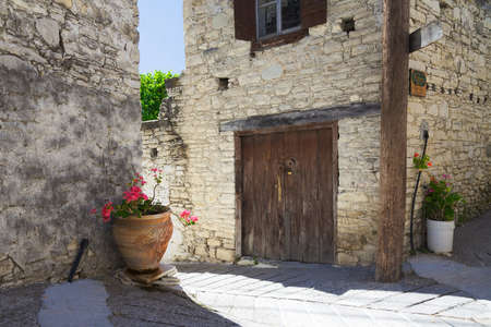 Old gate in the old stone house, mountain village, Cyprusの写真素材