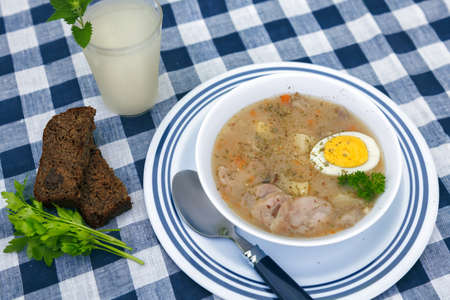 Zurek soup with white sausage and eggの写真素材