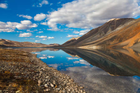 Reflection in polar mountain lake in Chukotka, Russiaの写真素材