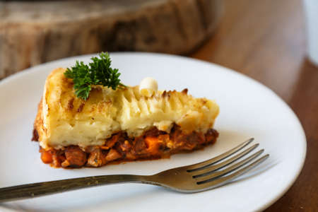 Baked Irish pie with minced meat on a plateの写真素材