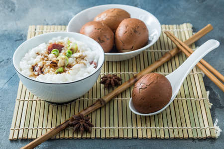 Tea eggs with rice porrige, chinese breakfast.
