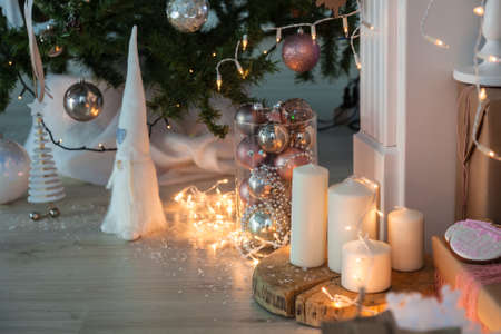 Christmas Decorations with Gingerbread man, lamp with candle and christmas baubles.の写真素材