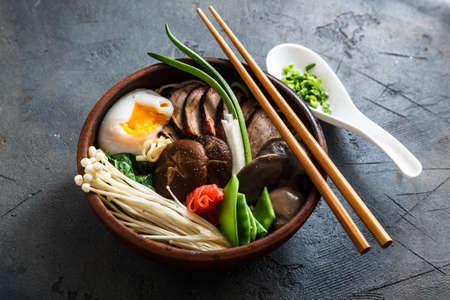 Asian Shiitake Enoki spring onions Mushroom egg Noodle or ramenの写真素材