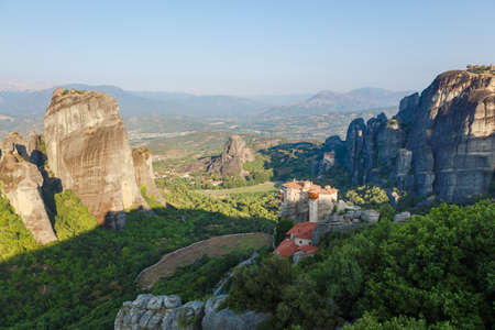 Sunlight over monastery Roussanou in the morning on top of the mountain, Meteora, Greece