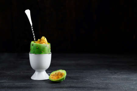 Prickly pear fruit or cactus opentia in egg cup, close view, copyspaceの写真素材