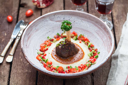 Traditional turkish dish Sultan Choise or Hunkar Begendi - Lamb casserole with eggplant puree with fresh vegsの写真素材