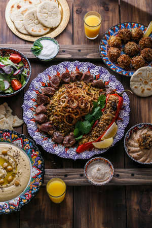 Middle eastern or arabic dishes and assorted meze on a dark backgroundの写真素材