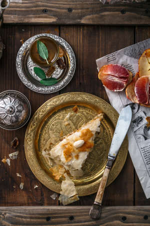 Piece of moroccan pie on copper plate