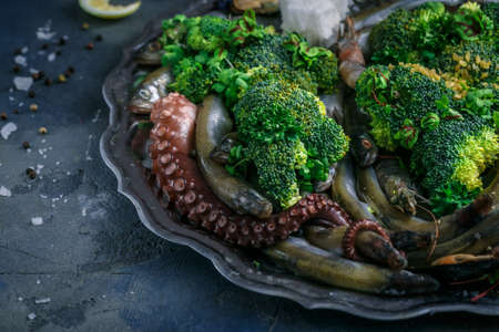 Close view of Raw Mixed seafood with vegs
