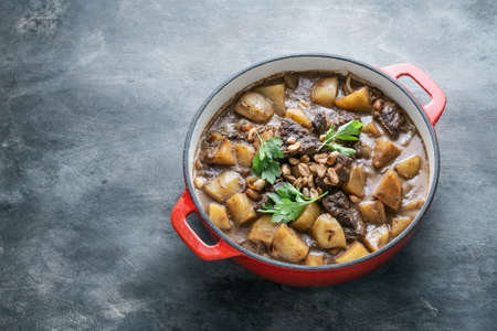 Potato and beef stew in spicy coconut gravy, thai cuisine, copy space