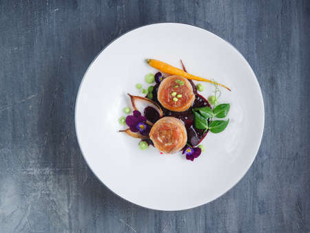 Cooked Pork Loin Roast with Vegetables, restaurant dish.の写真素材