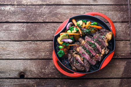 Grilled Beef Steak on grill iron pan, copy spaceの写真素材