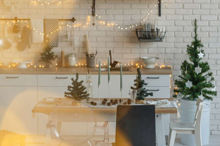 Christmas kitchen table in loft style decorationの写真素材
