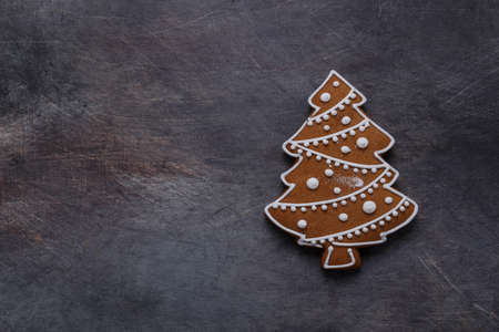 Gingerbread cookies tree on dark background, copyspaceの写真素材