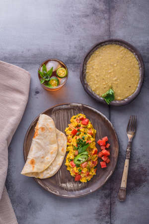 Scrambled eggs with onion and indian spices, indian cuisineの写真素材