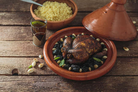 Moroccan food, tajine of chicken and prunes, copy space.の写真素材