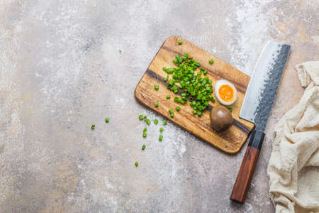 Soy sauce marinated egg with green onion, copy spaceの写真素材