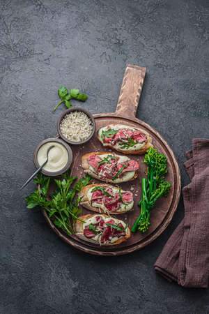 Crusty bread with beef, top view, copy spaceの写真素材