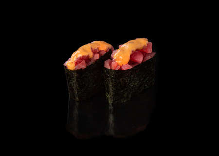 Spicy Gunkan maki sushi with tuna, black backgroundの写真素材
