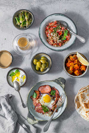 Healthy Turkish breakfast spread in the bright morning, white backgroundの写真素材