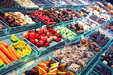 Stall with chocolates candy at Boqueria Market in Barcelona.の写真素材