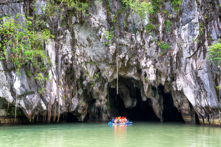 Visitors enter the Subterranean River in Puerto Princessa  Puerto Princesa Underground River as one...