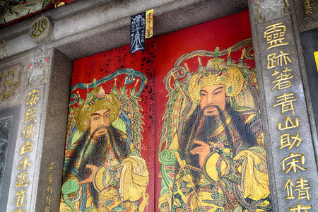 General Hsieh Pi-an and Fan Wu-ti, the two guardians painted on the front door of the Qingshan Temple のeditorial素材