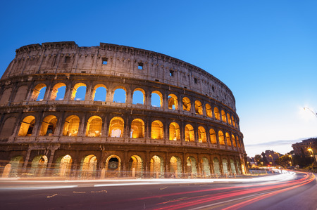 Colosseum at night with colorful blurred traffic lights.Rome - Italyの写真素材