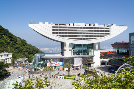 Hong Kong, Hong Kong SAR -November 15, 2014:The Peak Tower in Hong Kong with many tourists. The Peak Tower  is one of the most popular spot among tourist visiting Hong Kong.のeditorial素材