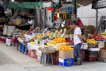 Hong Kong, Hong Kong SAR -November 09, 2014:Market Stall in Graham Street  Market.Graham Street Market is popular tourist destination in Hong Kong.のeditorial素材