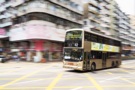 Hong Kong, Hong Kong SAR -November 13, 2014: Rush hour in Hong Kong, double-decker in blurred motion.のeditorial素材