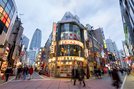 Tokyo; Japan -January 11; 2016: Street view of Nishi Shinjuku Shopping street whith several Japanese...